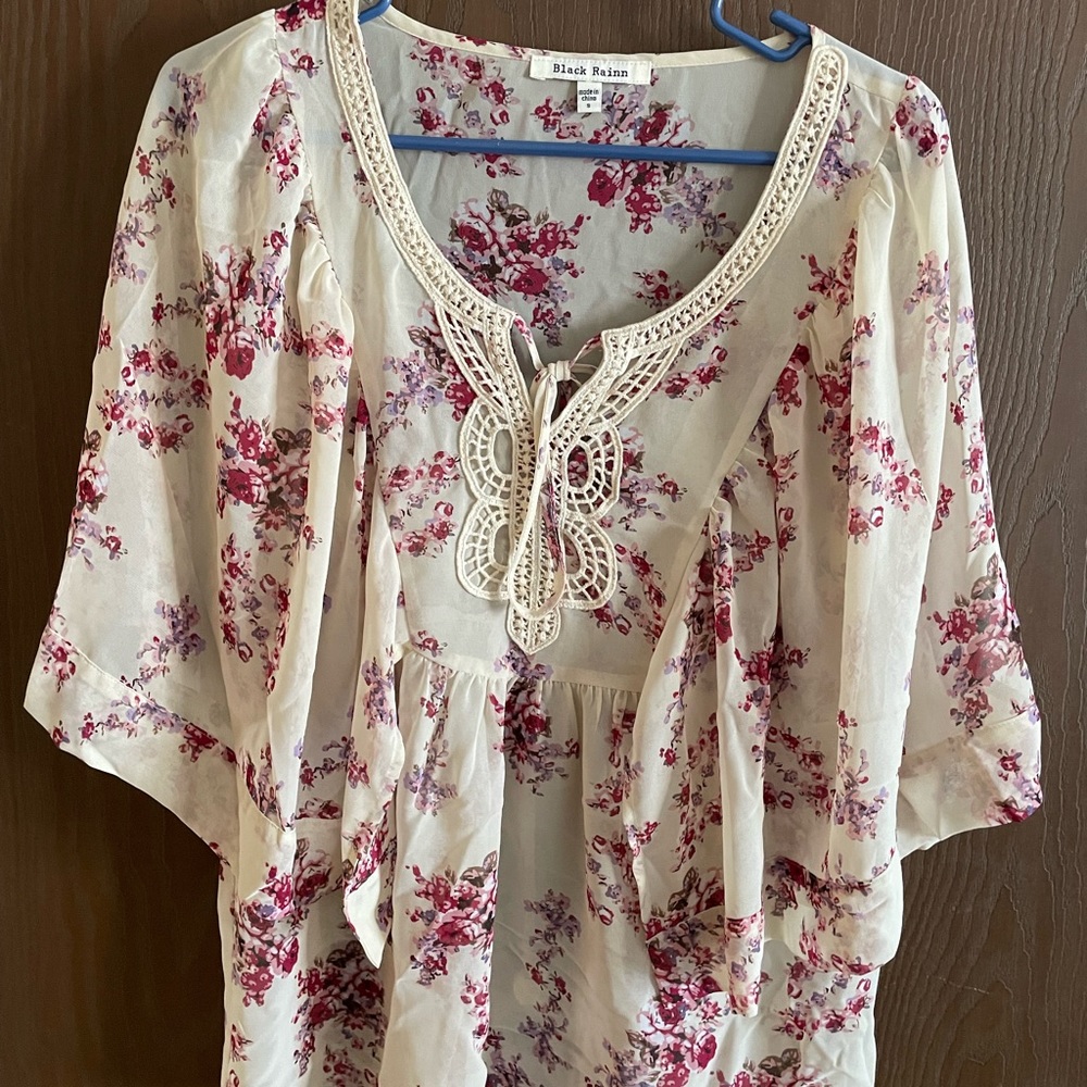 This is a cute sheer shirt.
